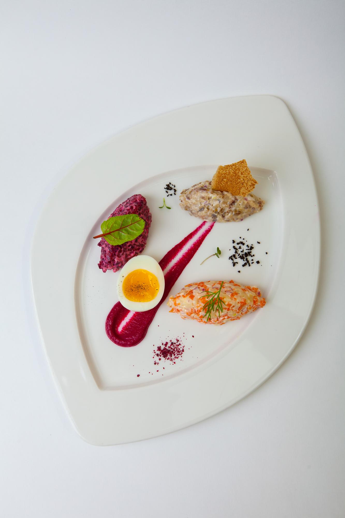 Plated tasting menu across table